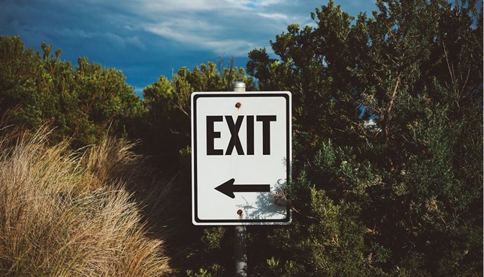 White EXIT sign