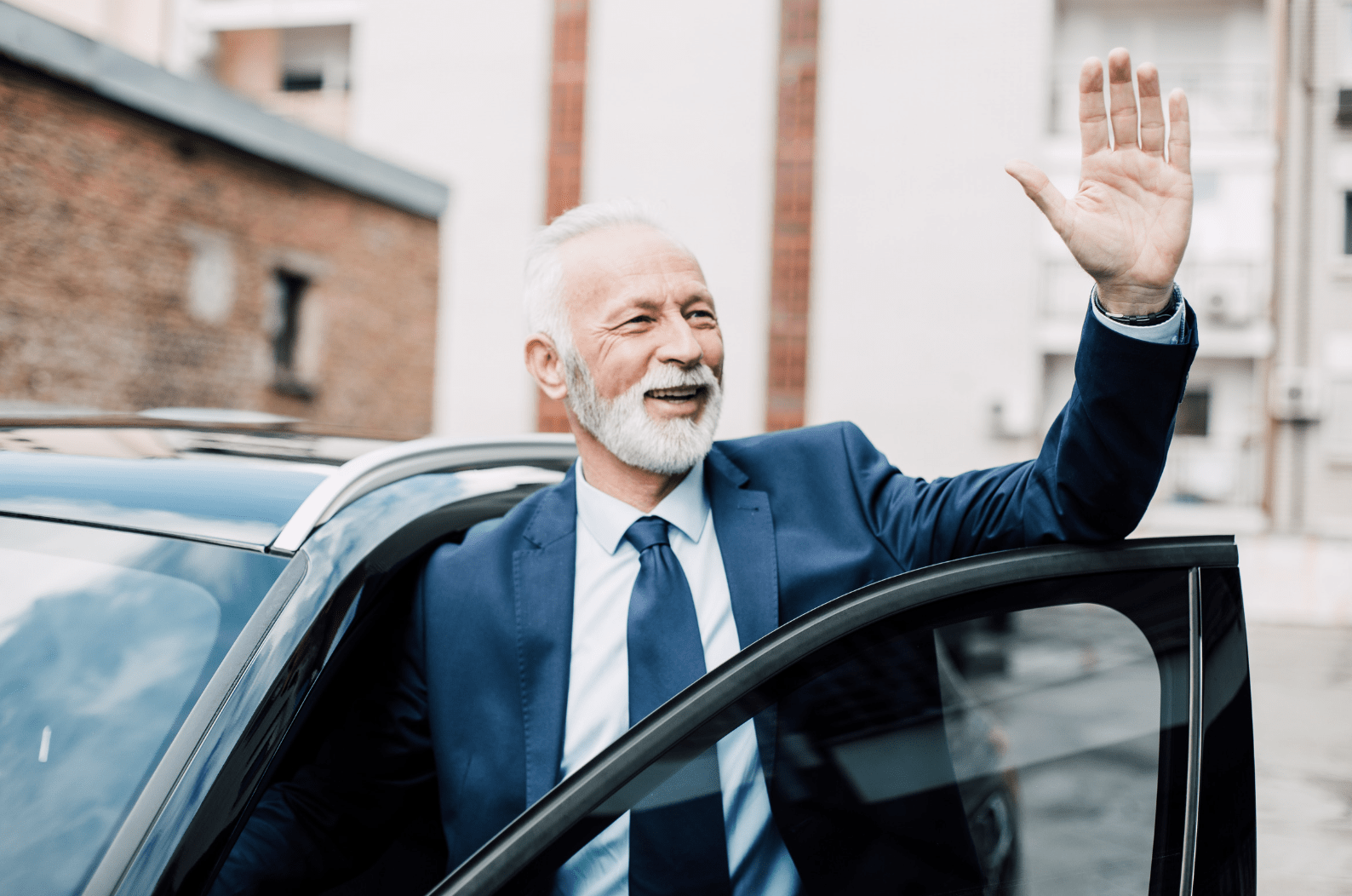 Business person waving