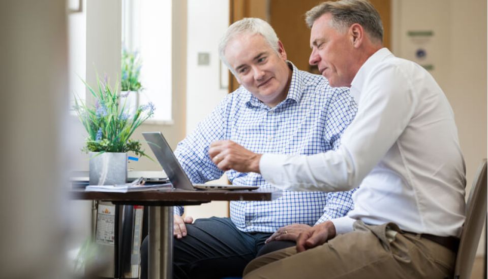 Man giving a talk on how to become a business coach