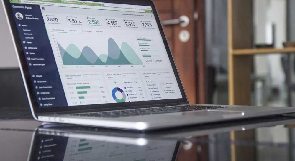 A picture of a laptop showing data